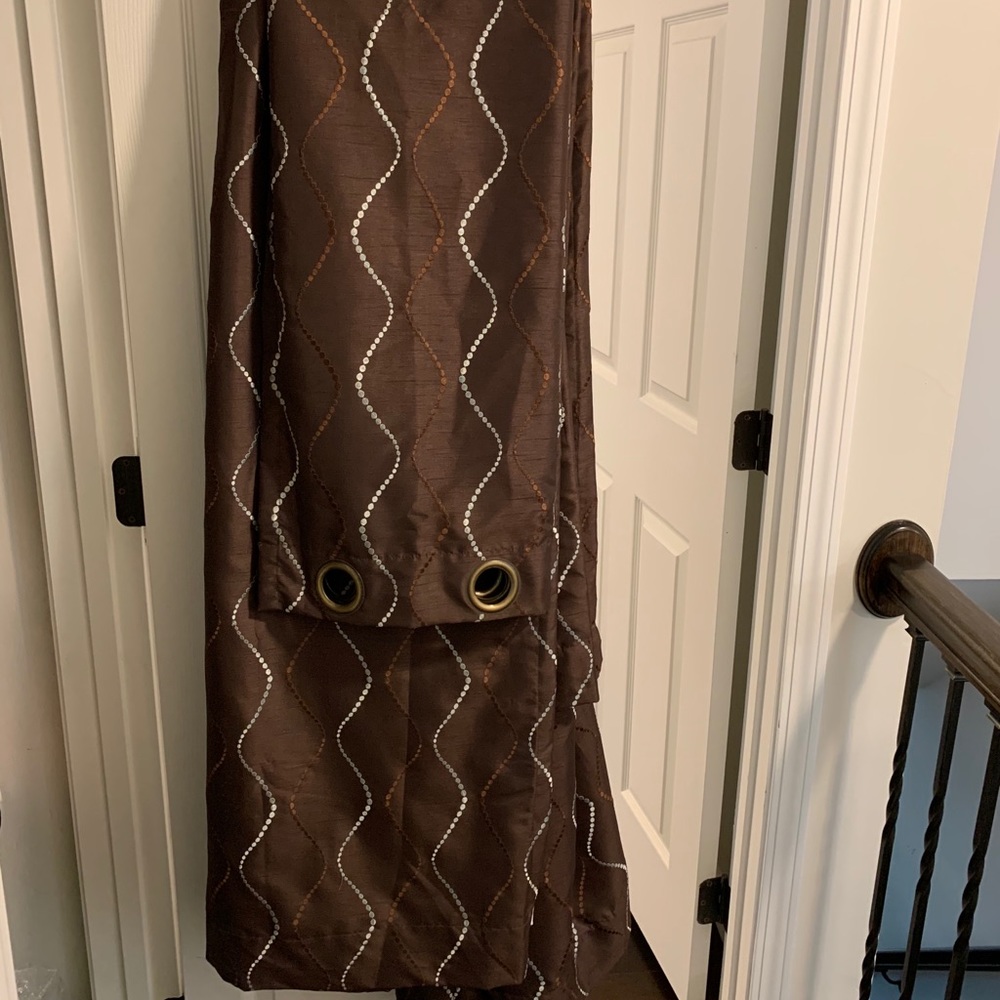 2 brown curtain panels
